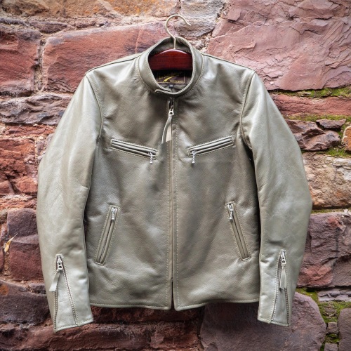 Olive leather jacket on hanger