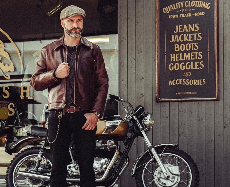 are leather jackets comfortable? man wearing leather jacket stood infront of motorcycle