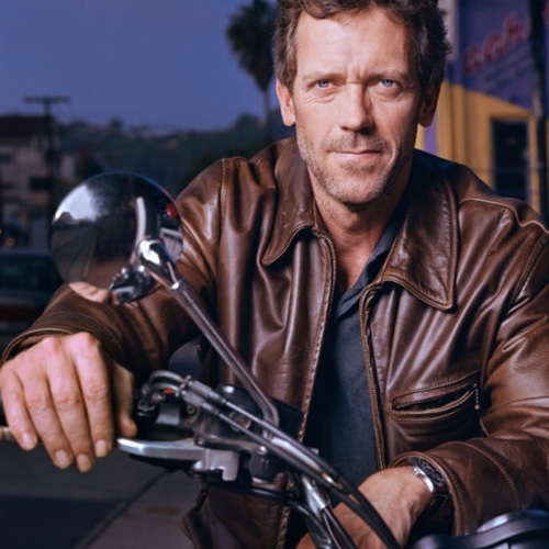 Actor Hugh Laurie wearing a Highwayman jacket